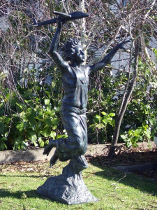 Boy With Plane bronze statue